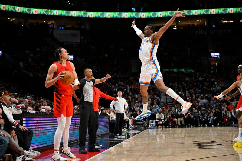 PORTLAND, OREGON - MARCH 06: Jalen Williams #8 of the Oklahoma City Thunder leaps to block Dalano Banton #5 of the Portland Trail Blazers inbound pass during the second quarter of the game at the Moda Center on March 06, 2024 in Portland, Oregon. NOTE TO USER: User expressly acknowledges and agrees that, by downloading and or using this photograph, User is consenting to the terms and conditions of the Getty Images License Agreement. (Photo by Alika Jenner/Getty Images)