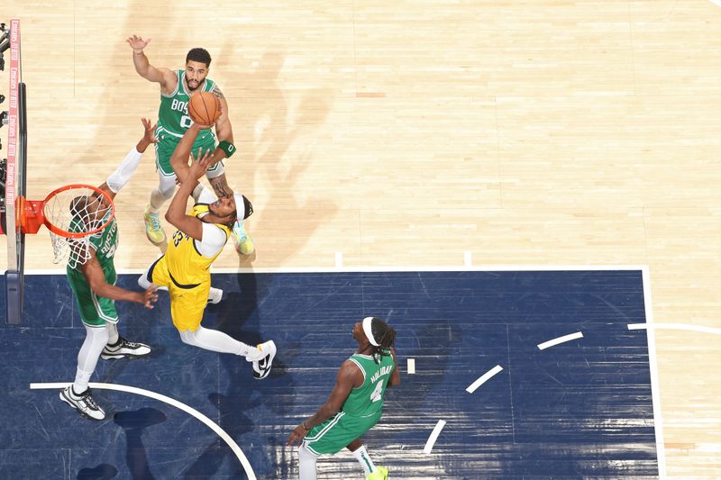 INDIANAPOLIS, IN - MAY 27: Myles Turner #33 of the Indiana Pacers drives to the basket during the game against the Boston Celtics during Game 4 of the Eastern Conference Finals of the 2024 NBA Playoffs on May 27, 2024 at Gainbridge Fieldhouse in Indianapolis, Indiana. NOTE TO USER: User expressly acknowledges and agrees that, by downloading and or using this Photograph, user is consenting to the terms and conditions of the Getty Images License Agreement. Mandatory Copyright Notice: Copyright 2024 NBAE (Photo by Nathaniel S. Butler/NBAE via Getty Images)