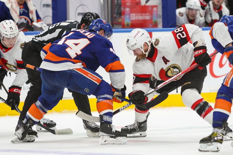 Mar 16, 2024; Elmont, New York, USA;  Ottawa Senators right wing Claude Giroux (28) and New York Islanders center Bo Horvat (14) face-off during the third period at UBS Arena. Mandatory Credit: Thomas Salus-USA TODAY Sports