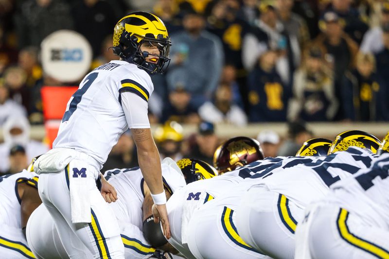 Oct 7, 2023; Minneapolis, Minnesota, USA; Michigan Wolverines quarterback J.J. McCarthy (9) lines up against the Minnesota Golden Gophers during the first quarter at Huntington Bank Stadium. Mandatory Credit: Matt Krohn-USA TODAY Sports