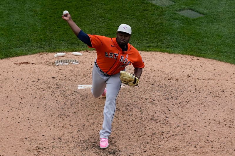 May 14, 2023; Chicago, Illinois, USA; Houston Astros relief pitcher Hector Neris (50) throws the ball against the Chicago White Sox during the seventh inning at Guaranteed Rate Field. Mandatory Credit: David Banks-USA TODAY Sports