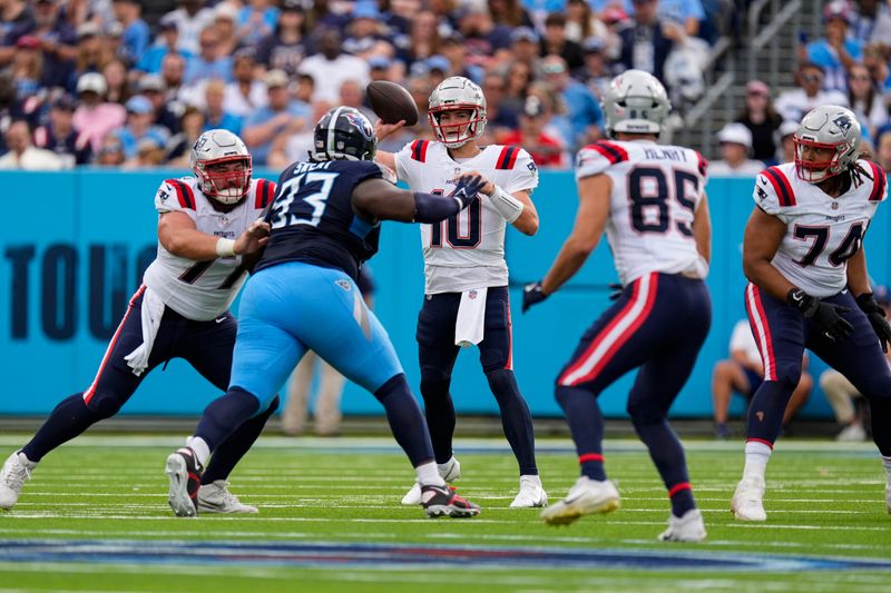 New England Patriots quarterback Drake Maye (10) throws against the Tennessee Titans during the first half of an NFL football game in Nashville, Tenn., Sunday, Nov. 3, 2024. (AP Photo/George Walker IV)