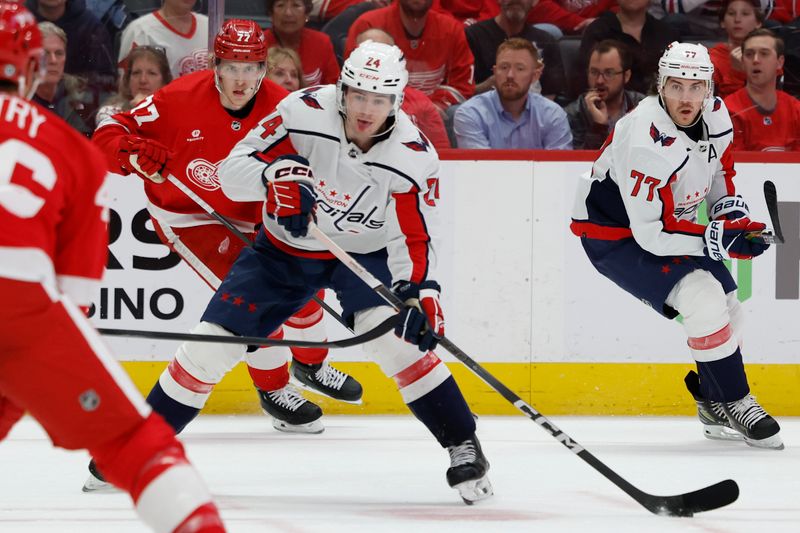 Apr 9, 2024; Detroit, Michigan, USA; Washington Capitals center Connor McMichael (24) skates with the puck in the first period against the Detroit Red Wings at Little Caesars Arena. Mandatory Credit: Rick Osentoski-USA TODAY Sports