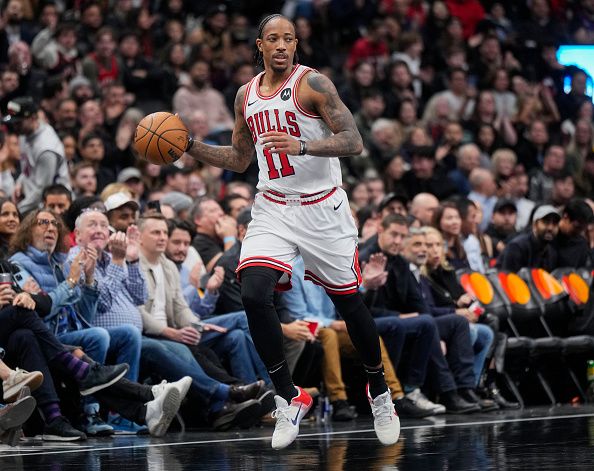 TORONTO, ON - NOVEMBER 24: DeMar DeRozan #11 of the Chicago Bulls dribbles against the Toronto Raptors during the second half of their NBA In-Season Tournament game at the Scotiabank Arena on November 24, 2023 in Toronto, Ontario, Canada. NOTE TO USER: User expressly acknowledges and agrees that, by downloading and/or using this Photograph, user is consenting to the terms and conditions of the Getty Images License Agreement. (Photo by Mark Blinch/Getty Images)