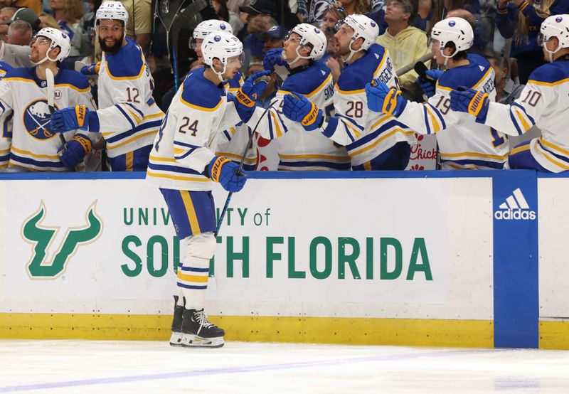 Apr 15, 2024; Tampa, Florida, USA; Buffalo Sabres center Dylan Cozens (24) is congratulated after he scored against the Tampa Bay Lightning during the first period at Amalie Arena. Mandatory Credit: Kim Klement Neitzel-USA TODAY Sports