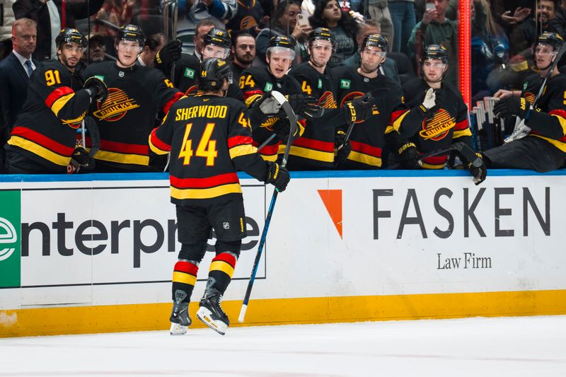 Dec 11, 2025; Vancouver, British Columbia, CAN; Vancouver Canucks forward Kiefer Sherwood (44) celebrates his goal against the Buffalo Sabres in the first period at Rogers Arena. Mandatory Credit: Bob Frid-Imagn Images
