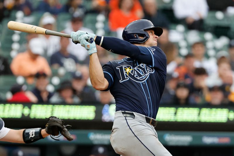 Sep 24, 2024; Detroit, Michigan, USA;  Tampa Bay Rays catcher Ben Rortvedt (30) hits a single in the fifth inning against the Detroit Tigers at Comerica Park. Mandatory Credit: Rick Osentoski-Imagn Images