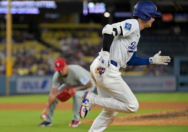 Sep 16, 2025; Los Angeles, California, USA;  Los Angeles Dodgers designated hitter Shohei Ohtani (17) grounds out to Philadelphia Phillies relief pitcher Jhoan Duran (59) for the last out of the ninth inning at Dodger Stadium. Mandatory Credit: Jayne Kamin-Oncea-Imagn Images