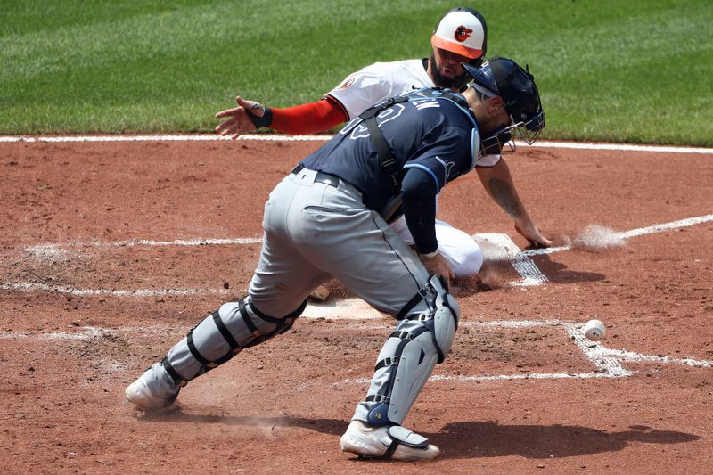 Jun 29, 2025; Baltimore, Maryland, USA; Baltimore Orioles catcher Gary Sanchez (99) scores during the fifth inning against the Tampa Bay Rays at Oriole Park at Camden Yards. Mandatory Credit: Daniel Kucin Jr.-Imagn Images