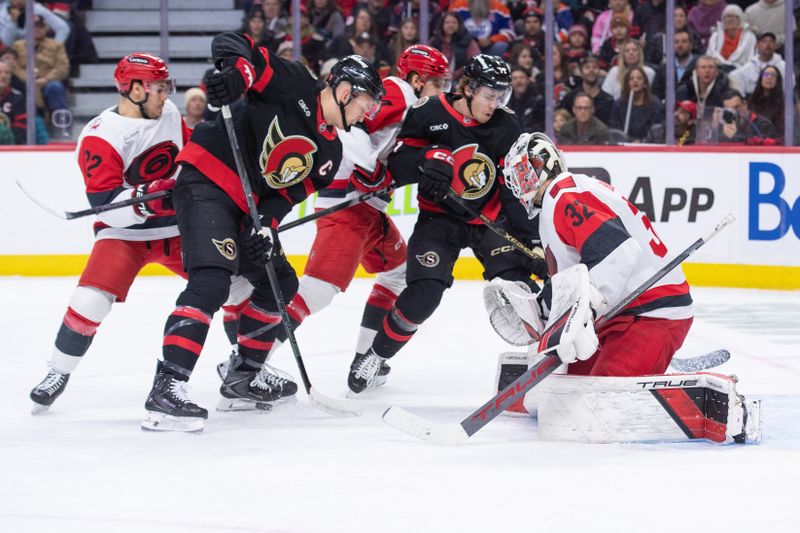 Jan 24, 2026; Ottawa, Ontario, CAN; Ottawa Senators left wing Brady Tkachuk (7) is unable to capitalize on a loose puck in front of Carolina Hurricanes goalie Brandon Bussi (32) in the first period at the Canadian Tire Centre. Mandatory Credit: Marc DesRosiers-IMAGN Images