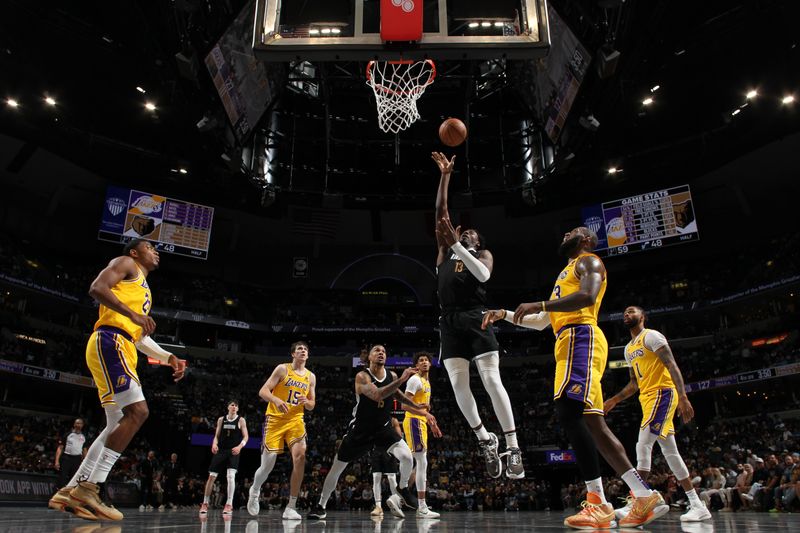 MEMPHIS, TN - MARCH 27: Jaren Jackson Jr. #13 of the Memphis Grizzlies shoots the ball during the game against the Los Angeles Lakers on March 27, 2024 at FedExForum in Memphis, Tennessee. NOTE TO USER: User expressly acknowledges and agrees that, by downloading and or using this photograph, User is consenting to the terms and conditions of the Getty Images License Agreement. Mandatory Copyright Notice: Copyright 2024 NBAE (Photo by Joe Murphy/NBAE via Getty Images)