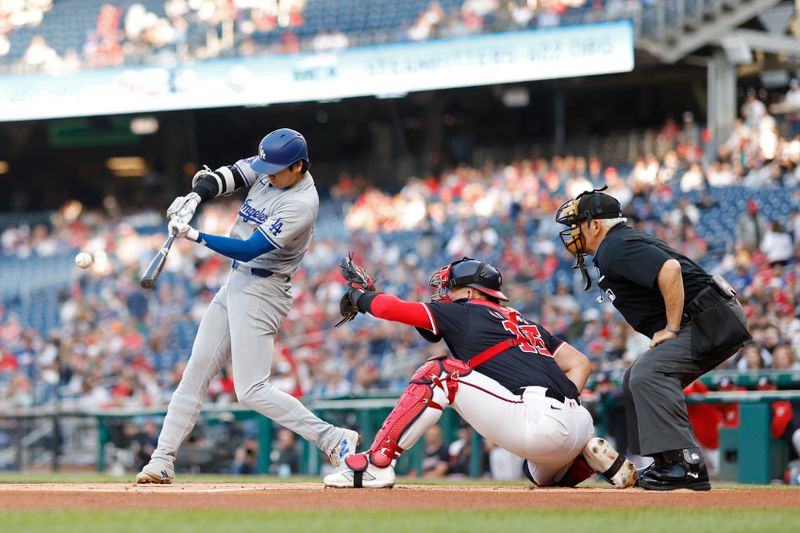 Apr 24, 2024; Washington, District of Columbia, USA; Los Angeles Dodgers designated hitter Shohei Ohtani (17) doubles against the Washington Nationals during the first inning at Nationals Park. Mandatory Credit: Geoff Burke-USA TODAY Sports