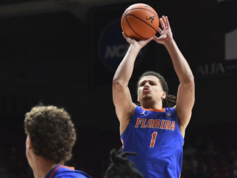 Feb 21, 2024; Tuscaloosa, Alabama, USA;  Florida Gators guard Walter Clayton Jr. (1) shoots a jump shot over the Alabama Crimson Tide defense at Coleman Coliseum. Mandatory Credit: Gary Cosby Jr.-USA TODAY Sports