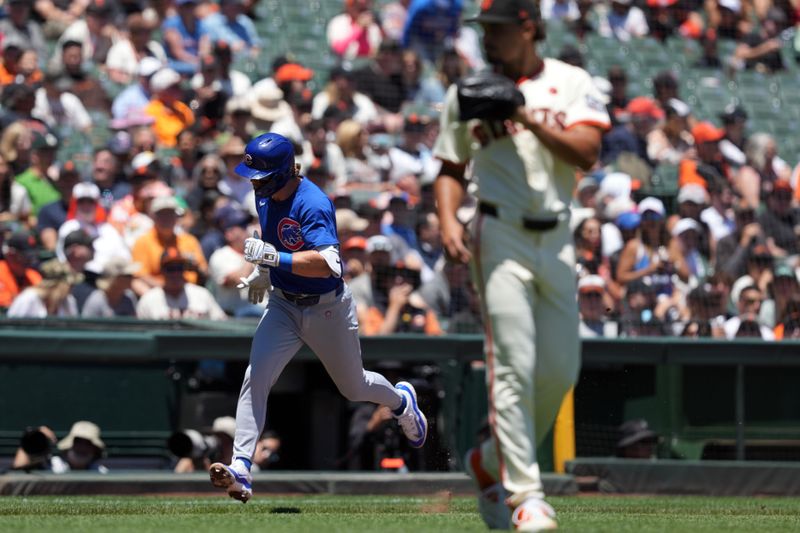 Jun 27, 2024; San Francisco, California, USA; Chicago Cubs second baseman Nico Hoerner (left) rounds the bases after hitting a home run against San Francisco Giants starting pitcher Jordan Hicks (right) during the third inning at Oracle Park. Mandatory Credit: Darren Yamashita-USA TODAY Sports