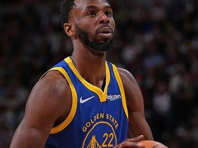 DENVER, CO - DECEMBER 25: Andrew Wiggins #22 of the Golden State Warriors shoots a free throw during the game against the Denver Nuggets on December 25, 2023 at the Ball Arena in Denver, Colorado. NOTE TO USER: User expressly acknowledges and agrees that, by downloading and/or using this Photograph, user is consenting to the terms and conditions of the Getty Images License Agreement. Mandatory Copyright Notice: Copyright 2023 NBAE (Photo by Bart Young/NBAE via Getty Images)