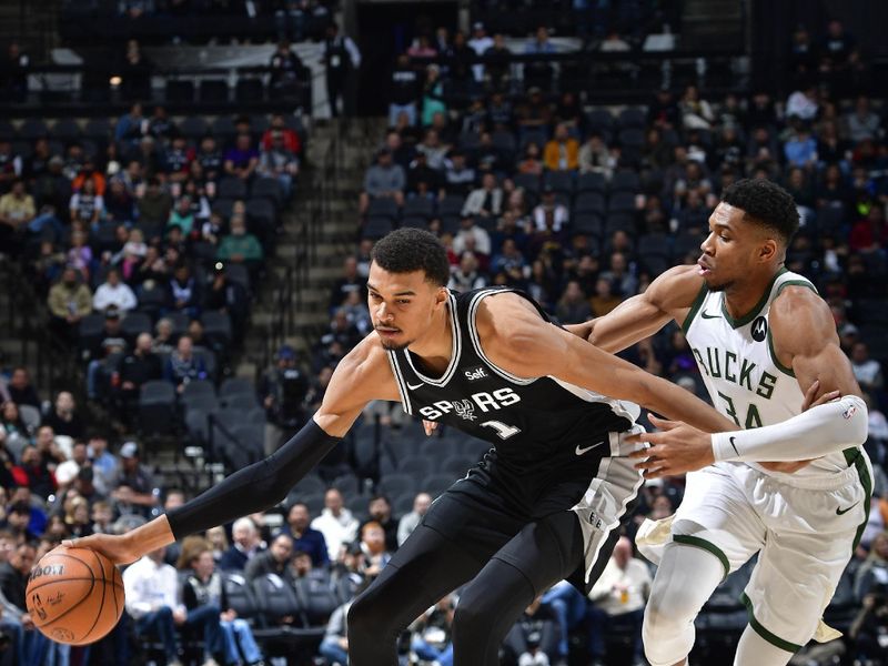 SAN ANTONIO, TX - JANUARY 4: Victor Wembanyama #1 of the San Antonio Spurs handles the ball during the game against the Milwaukee Bucks on January 4, 2024 at the Frost Bank Center in San Antonio, Texas. NOTE TO USER: User expressly acknowledges and agrees that, by downloading and or using this photograph, User is consenting to the terms and conditions of the Getty Images License Agreement. Mandatory Copyright Notice: Copyright 2024 NBAE (Photo by Logan Riely/NBAE via Getty Images)