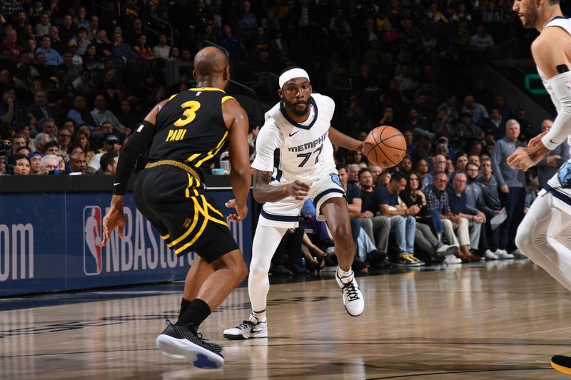 SAN FRANCISCO, CA - MARCH 20: Dejon Jarreau #77 of the Memphis Grizzlies dribbles the ball during the game against the Golden State Warriors on March 20, 2024 at Chase Center in San Francisco, California. NOTE TO USER: User expressly acknowledges and agrees that, by downloading and or using this photograph, user is consenting to the terms and conditions of Getty Images License Agreement. Mandatory Copyright Notice: Copyright 2024 NBAE (Photo by Noah Graham/NBAE via Getty Images)