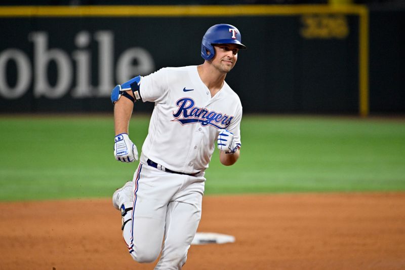 Oct 10, 2023; Arlington, Texas, USA; Texas Rangers first baseman Nathaniel Lowe (30) runs the bases after hitting a solo home run against the Baltimore Orioles in the sixth inning during game three of the ALDS for the 2023 MLB playoffs at Globe Life Field. Mandatory Credit: Jerome Miron-USA TODAY Sports