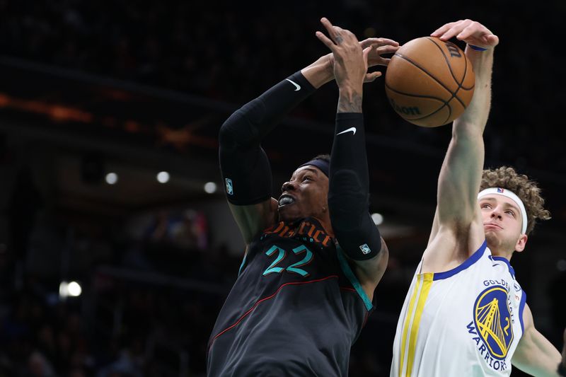 WASHINGTON, DC - FEBRUARY 27: Richaun Holmes #22 of the Washington Wizards has his shot blocked by Brandin Podziemski #2 of the Golden State Warriors during the second half at Capital One Arena on February 27, 2024 in Washington, DC. NOTE TO USER: User expressly acknowledges and agrees that, by downloading and or using this photograph, User is consenting to the terms and conditions of the Getty Images License Agreement. (Photo by Patrick Smith/Getty Images)