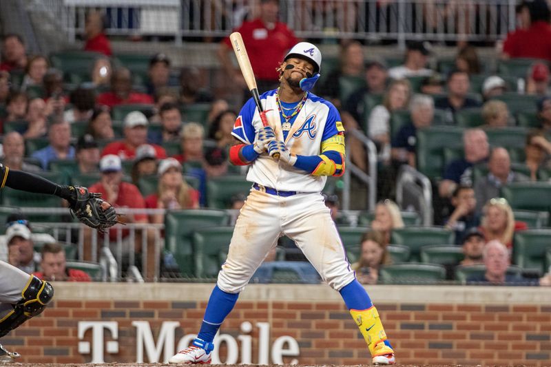 Sep 9, 2023; Cumberland, Georgia, USA; Atlanta Braves right fielder Ronald Acuna Jr. (13) reacts to pitch from Pittsburgh Pirates during fifth inning at Truist Park. Mandatory Credit: Jordan Godfree-USA TODAY Sports