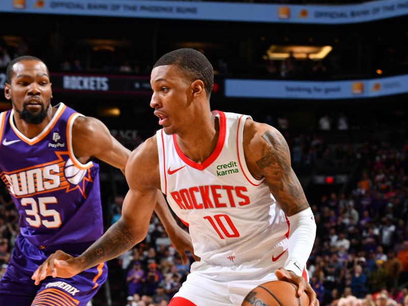 PHOENIX, AZ - MARCH 2: Jabari Smith Jr. #10 of the Houston Rockets dribbles the ball during the game against the Phoenix Suns on March 2, 2024 at Footprint Center in Phoenix, Arizona. NOTE TO USER: User expressly acknowledges and agrees that, by downloading and or using this photograph, user is consenting to the terms and conditions of the Getty Images License Agreement. Mandatory Copyright Notice: Copyright 2024 NBAE (Photo by Barry Gossage/NBAE via Getty Images)