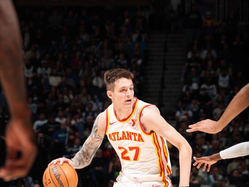 MINNEAPOLIS, MN -  APRIL 12:  Vit Krejci #27 of the Atlanta Hawks handles the ball during the game against the Minnesota Timberwolves on April 12, 2024 at Target Center in Minneapolis, Minnesota. NOTE TO USER: User expressly acknowledges and agrees that, by downloading and or using this Photograph, user is consenting to the terms and conditions of the Getty Images License Agreement. Mandatory Copyright Notice: Copyright 2024 NBAE (Photo by David Sherman/NBAE via Getty Images)