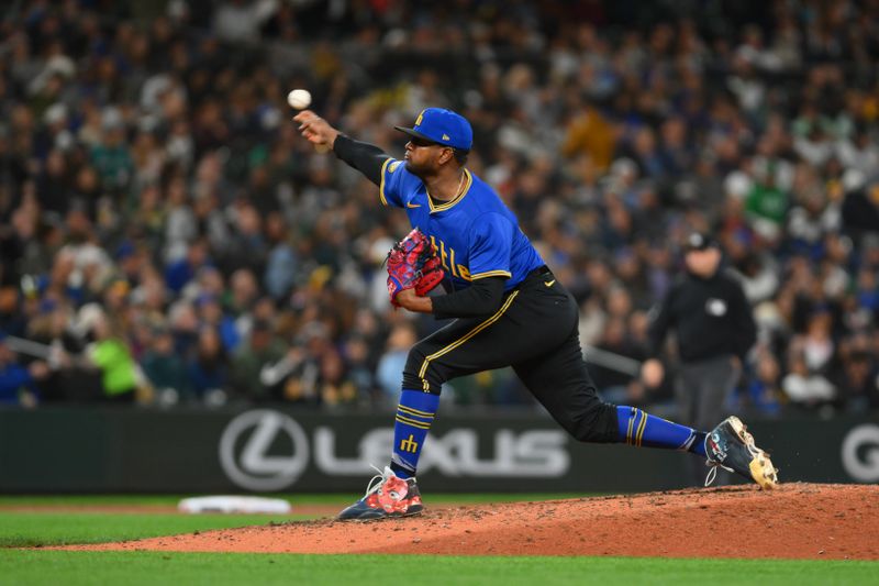 Sep 27, 2024; Seattle, Washington, USA; Seattle Mariners relief pitcher Gregory Santos (48) pitches to the Oakland Athletics during the seventh inning at T-Mobile Park. Mandatory Credit: Steven Bisig-Imagn Images