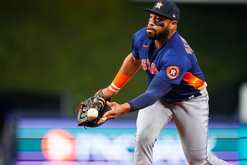 Aug 14, 2023; Miami, Florida, USA; Houston Astros first baseman Jon Singleton (28) throws the ball to first base for an out against the Miami Marlins during the fourth inning at loanDepot Park. Mandatory Credit: Rich Storry-USA TODAY Sports