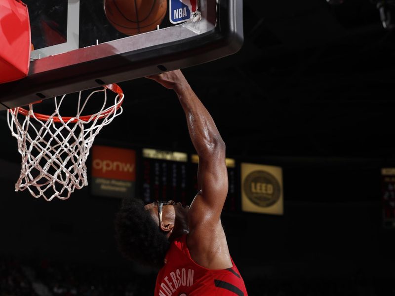 PORTLAND, OR - MARCH 23: Scoot Henderson #00 of the Portland Trail Blazers drives to the basket during the game against the Denver Nuggets on March 23, 2024 at the Moda Center Arena in Portland, Oregon. NOTE TO USER: User expressly acknowledges and agrees that, by downloading and or using this photograph, user is consenting to the terms and conditions of the Getty Images License Agreement. Mandatory Copyright Notice: Copyright 2024 NBAE (Photo by Cameron Browne/NBAE via Getty Images)