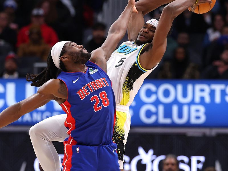 DETROIT, MICHIGAN - JANUARY 16: Jarace Walker #5 of the Indiana Pacers grabs a second half rebound against Isaiah Stewart #28 of the Detroit Pistons at Little Caesars Arena on January 16, 2025 in Detroit, Michigan. Indiana won the game 111-100. NOTE TO USER: User expressly acknowledges and agrees that, by downloading and or using this photograph, User is consenting to the terms and conditions of the Getty Images License. (Photo by Gregory Shamus/Getty Images)