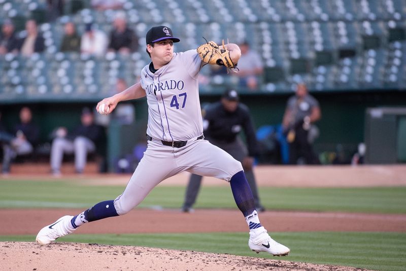 May 21, 2024; Oakland, California, USA; Colorado Rockies starting pitcher Cal Quantrill (47) throws a pitch against the Oakland Athletics during the fourth inning at Oakland-Alameda County Coliseum. Mandatory Credit: Ed Szczepanski-USA TODAY Sports