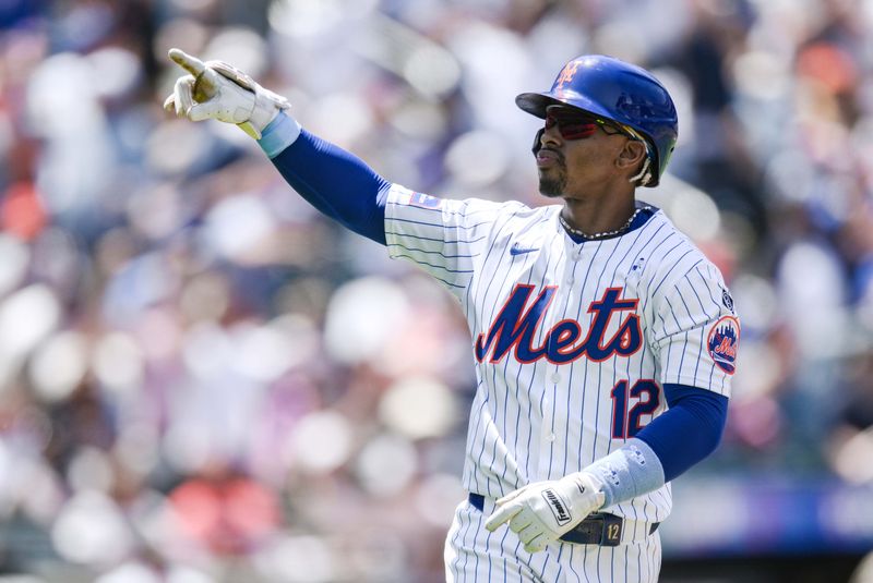 Jun 16, 2024; New York City, New York, USA; New York Mets shortstop Francisco Lindor (12) reacts after hitting a solo home run during his MLB baseball game against the San Diego Padres during the first inning at Citi Field. Mandatory Credit: John Jones-USA TODAY Sports