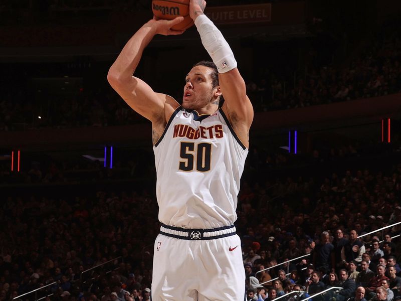 NEW YORK, NY - JANUARY 25: Aaron Gordon #50 of the Denver Nuggets three point basket during the game against the New York Knicks on January 25, 2024 at Madison Square Garden in New York City, New York.  NOTE TO USER: User expressly acknowledges and agrees that, by downloading and or using this photograph, User is consenting to the terms and conditions of the Getty Images License Agreement. Mandatory Copyright Notice: Copyright 2024 NBAE  (Photo by Nathaniel S. Butler/NBAE via Getty Images)