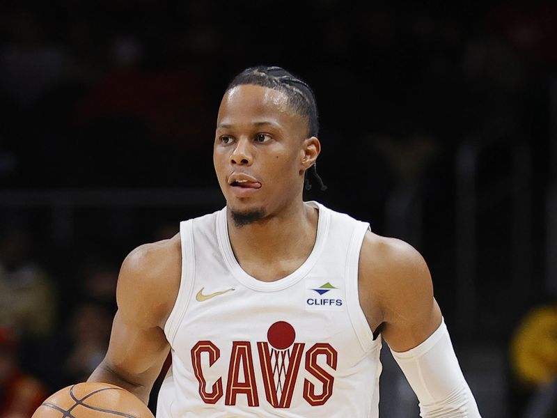 ATLANTA, GEORGIA - JANUARY 20: Isaac Okoro #35 of the Cleveland Cavaliers drives down court against the Atlanta Hawks during the first half at State Farm Arena on January 20, 2024 in Atlanta, Georgia. NOTE TO USER: User expressly acknowledges and agrees that, by downloading and or using this photograph, User is consenting to the terms and conditions of the Getty Images License Agreement. (Photo by Alex Slitz/Getty Images)