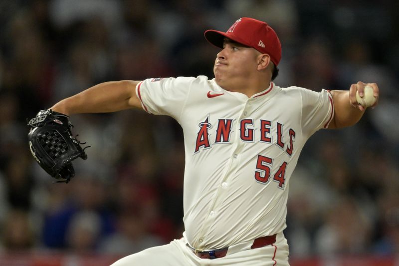 May 30, 2024; Anaheim, California, USA;  Los Angeles Angels relief pitcher Jose Suarez (54) delivers a pitch in the ninth inning against the New York Yankees at Angel Stadium. Mandatory Credit: Jayne Kamin-Oncea-USA TODAY Sports