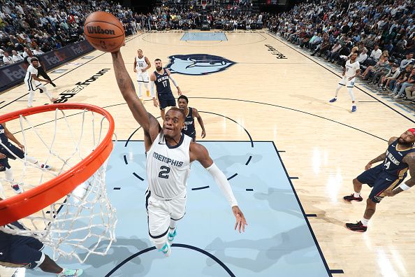 MEMPHIS, TN - OCTOBER 25: Xavier Tillman #2 of the Memphis Grizzlies drives to the basket during the game against the New Orleans Pelicans on October 25, 2023 at FedExForum in Memphis, Tennessee. NOTE TO USER: User expressly acknowledges and agrees that, by downloading and or using this photograph, User is consenting to the terms and conditions of the Getty Images License Agreement. Mandatory Copyright Notice: Copyright 2023 NBAE (Photo by Joe Murphy/NBAE via Getty Images)