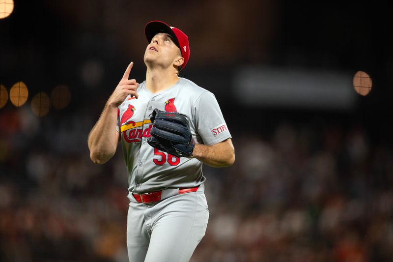 Sep 27, 2024; San Francisco, California, USA; St. Louis Cardinals pitcher Ryan Helsley (56) reacts to getting the final out against the San Francisco Giants during the ninth inning at Oracle Park. Mandatory Credit: D. Ross Cameron-Imagn Images