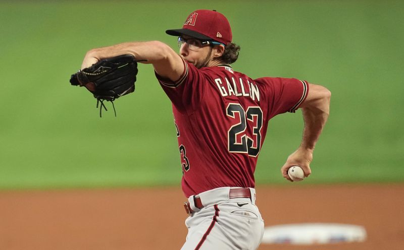 Apr 16, 2023; Miami, Florida, USA;  Arizona Diamondbacks starting pitcher Zac Gallen (23) pitches against the Miami Marlins in the first inning at loanDepot Park. Mandatory Credit: Jim Rassol-USA TODAY Sports