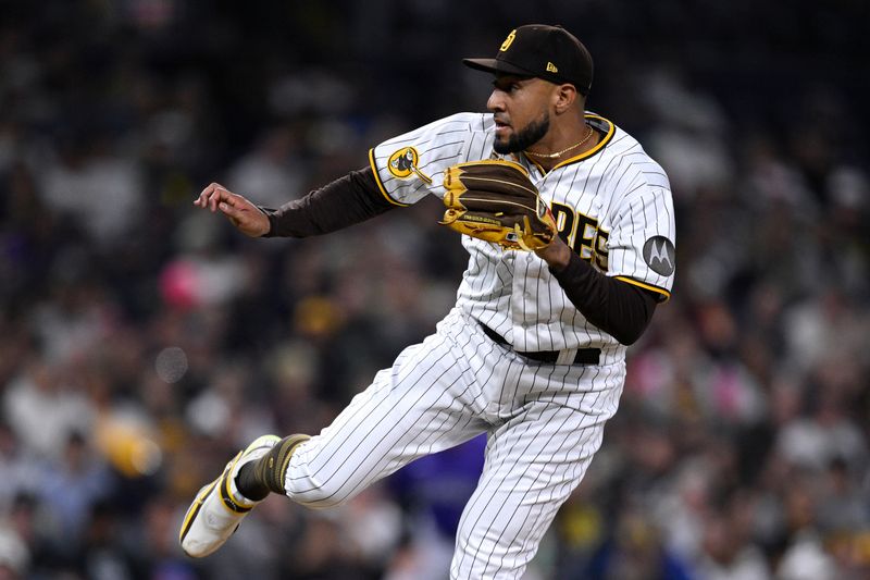 Sep 19, 2023; San Diego, California, USA; San Diego Padres relief pitcher Robert Suarez (75) throws a pitch against the Colorado Rockies during the eighth inning at Petco Park. Mandatory Credit: Orlando Ramirez-USA TODAY Sports