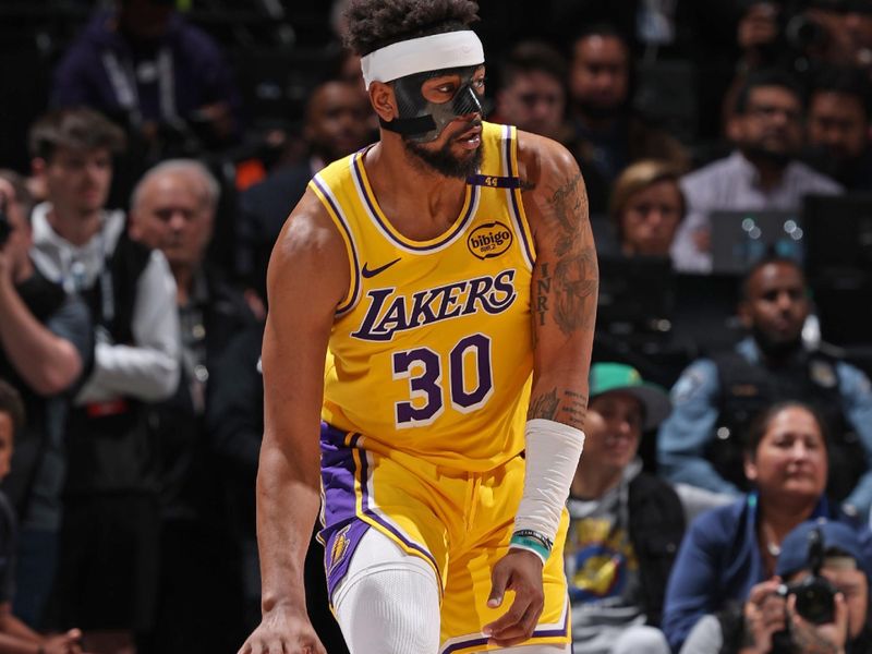 MINNEAPOLIS, MN -  APRIL 25:   Jordan Goodwin #30 of the Los Angeles Lakers dribbles the ball during the game against the Minnesota Timberwolves  during Round 1 Game 3 of the 2025 NBA Playoffs  on April 25, 2025 at Target Center in Minneapolis, Minnesota. NOTE TO USER: User expressly acknowledges and agrees that, by downloading and or using this Photograph, user is consenting to the terms and conditions of the Getty Images License Agreement. Mandatory Copyright Notice: Copyright 2025 NBAE (Photo by David Sherman/NBAE via Getty Images)