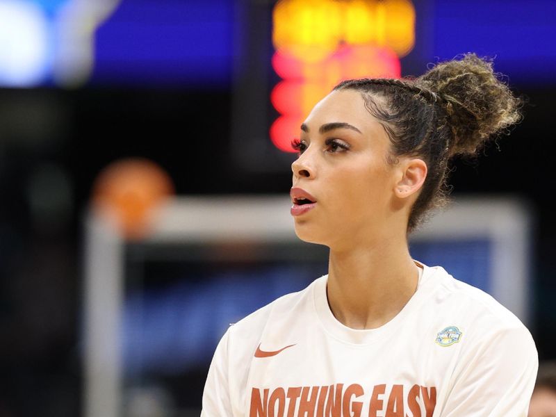 Apr 4, 2025; Tampa, FL, USA;  Texas Longhorns guard Jordana Codio (13) warms up prior to a semifinal of the women's 2025 NCAA tournament at Amalie Arena. Mandatory Credit: Nathan Ray Seebeck-Imagn Images
