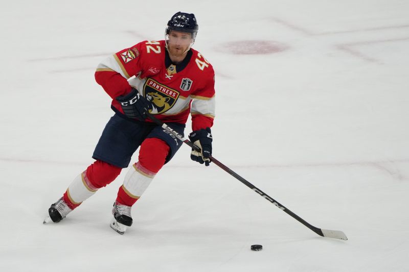 Jun 24, 2024; Sunrise, Florida, USA;  Florida Panthers defenseman Gustav Forsling (42) skates with the puck during the third period against the Edmonton Oilers in game seven of the 2024 Stanley Cup Final at Amerant Bank Arena. Mandatory Credit: Jim Rassol-USA TODAY Sports
