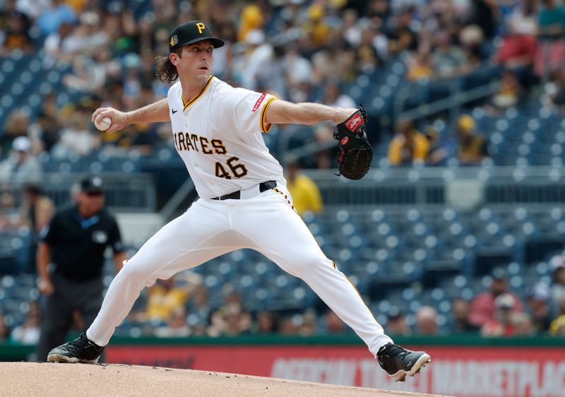 Aug 18, 2024; Pittsburgh, Pennsylvania, USA;  Pittsburgh Pirates starting pitcher Jake Woodford (46) delivers a pitch against the Seattle Mariners during the first inning at PNC Park. Mandatory Credit: Charles LeClaire-USA TODAY Sports