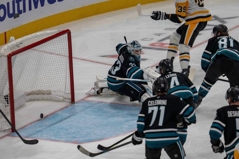 Oct 18, 2025; San Jose, California, USA; Pittsburgh Penguins right wing Anthony Mantha (not pictured) scores a goal against San Jose Sharks goaltender Alex Nedeljkovic (33) during the third period during the third period at SAP Center at San Jose. Mandatory Credit: Neville E. Guard-Imagn Images