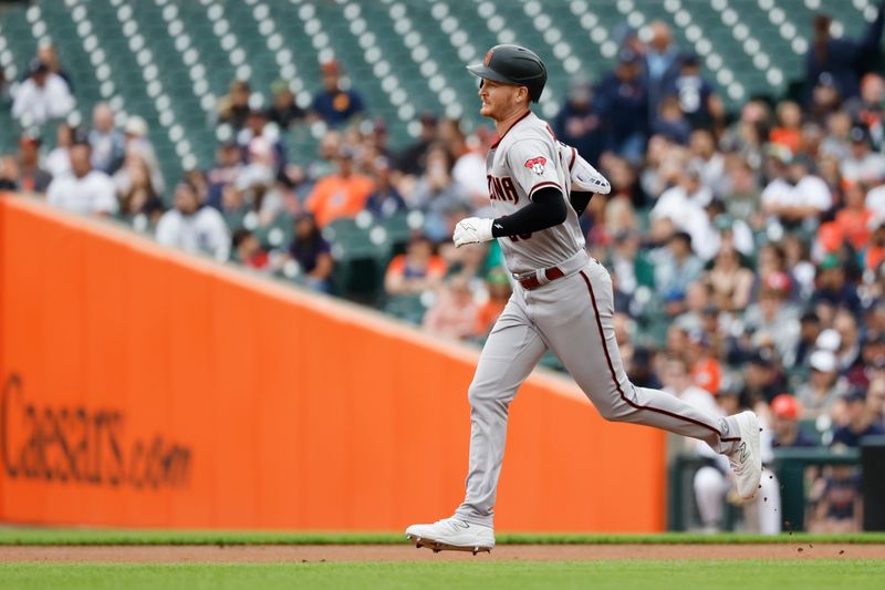 Jun 11, 2023; Detroit, Michigan, USA; Arizona Diamondbacks designated hitter Pavin Smith (26) runs the bases after he hits a two run home run in the second inning against the Detroit Tigers at Comerica Park. Mandatory Credit: Rick Osentoski-USA TODAY Sports