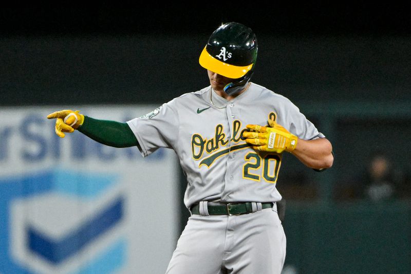 Aug 14, 2023; St. Louis, Missouri, USA;  Oakland Athletics second baseman Zack Gelof (20) reacts after hitting a one run double against the St. Louis Cardinals during the seventh inning at Busch Stadium. Mandatory Credit: Jeff Curry-USA TODAY Sports