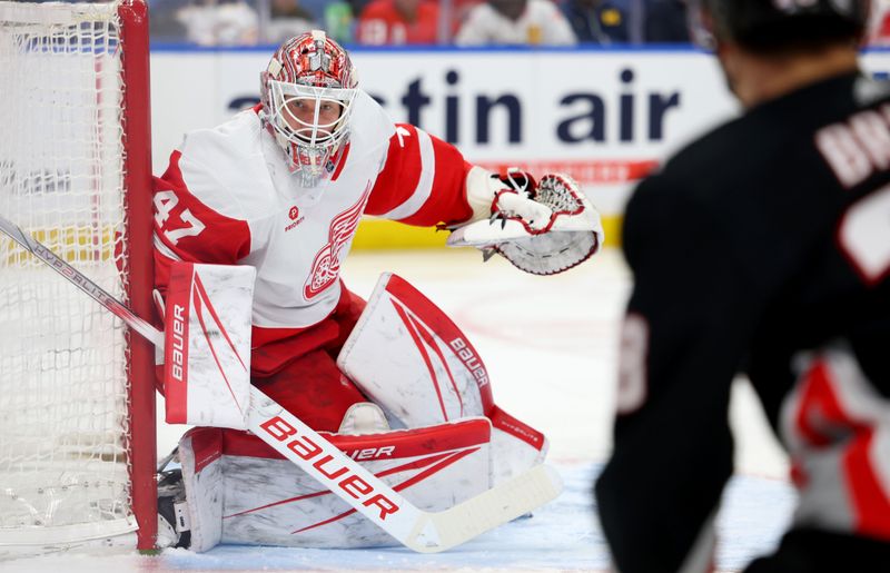 Mar 12, 2024; Buffalo, New York, USA;  Detroit Red Wings goaltender James Reimer (47) looks for the puck during the second period against the Buffalo Sabres at KeyBank Center. Mandatory Credit: Timothy T. Ludwig-USA TODAY Sports