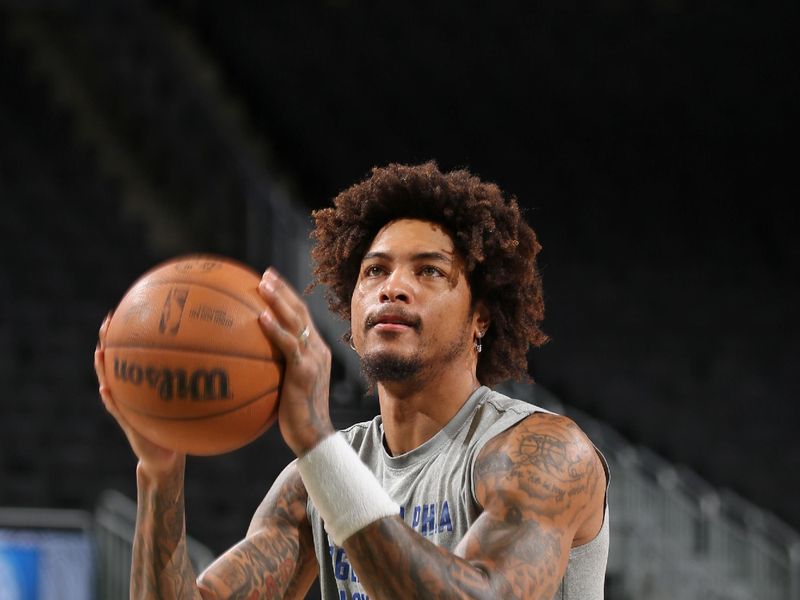 MILWAUKEE, WI - MARCH 14: Kelly Oubre Jr. #9 of the Philadelphia 76ers warms up before the game against the Milwaukee Bucks on March 14, 2024 at the Fiserv Forum Center in Milwaukee, Wisconsin. NOTE TO USER: User expressly acknowledges and agrees that, by downloading and or using this Photograph, user is consenting to the terms and conditions of the Getty Images License Agreement. Mandatory Copyright Notice: Copyright 2024 NBAE (Photo by Gary Dineen/NBAE via Getty Images).