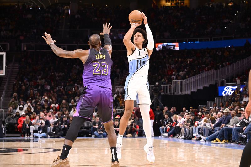 ATLANTA, GA - DECEMBER 6: Jalen Johnson #1 of the Atlanta Hawks shoots a three point basket during the game against the Los Angeles Lakers on December 6, 2024 at State Farm Arena in Atlanta, Georgia.  NOTE TO USER: User expressly acknowledges and agrees that, by downloading and/or using this Photograph, user is consenting to the terms and conditions of the Getty Images License Agreement. Mandatory Copyright Notice: Copyright 2024 NBAE (Photo by Adam Hagy/NBAE via Getty Images)