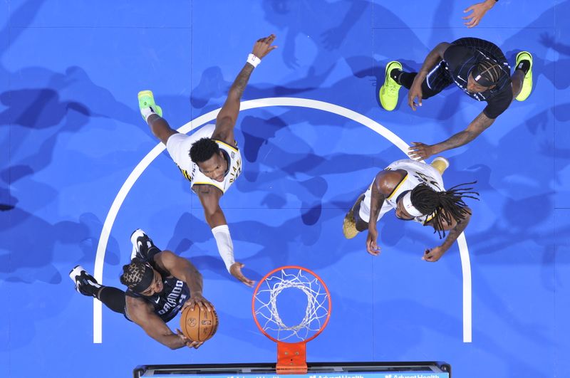 ORLANDO, FL - OCTOBER 28: Wendell Carter Jr. #34 of the Orlando Magic drives to the basket during the game against the Indiana Pacers on October 28, 2024 at Kia Center in Orlando, Florida. NOTE TO USER: User expressly acknowledges and agrees that, by downloading and or using this photograph, User is consenting to the terms and conditions of the Getty Images License Agreement. Mandatory Copyright Notice: Copyright 2024 NBAE (Photo by Fernando Medina/NBAE via Getty Images)